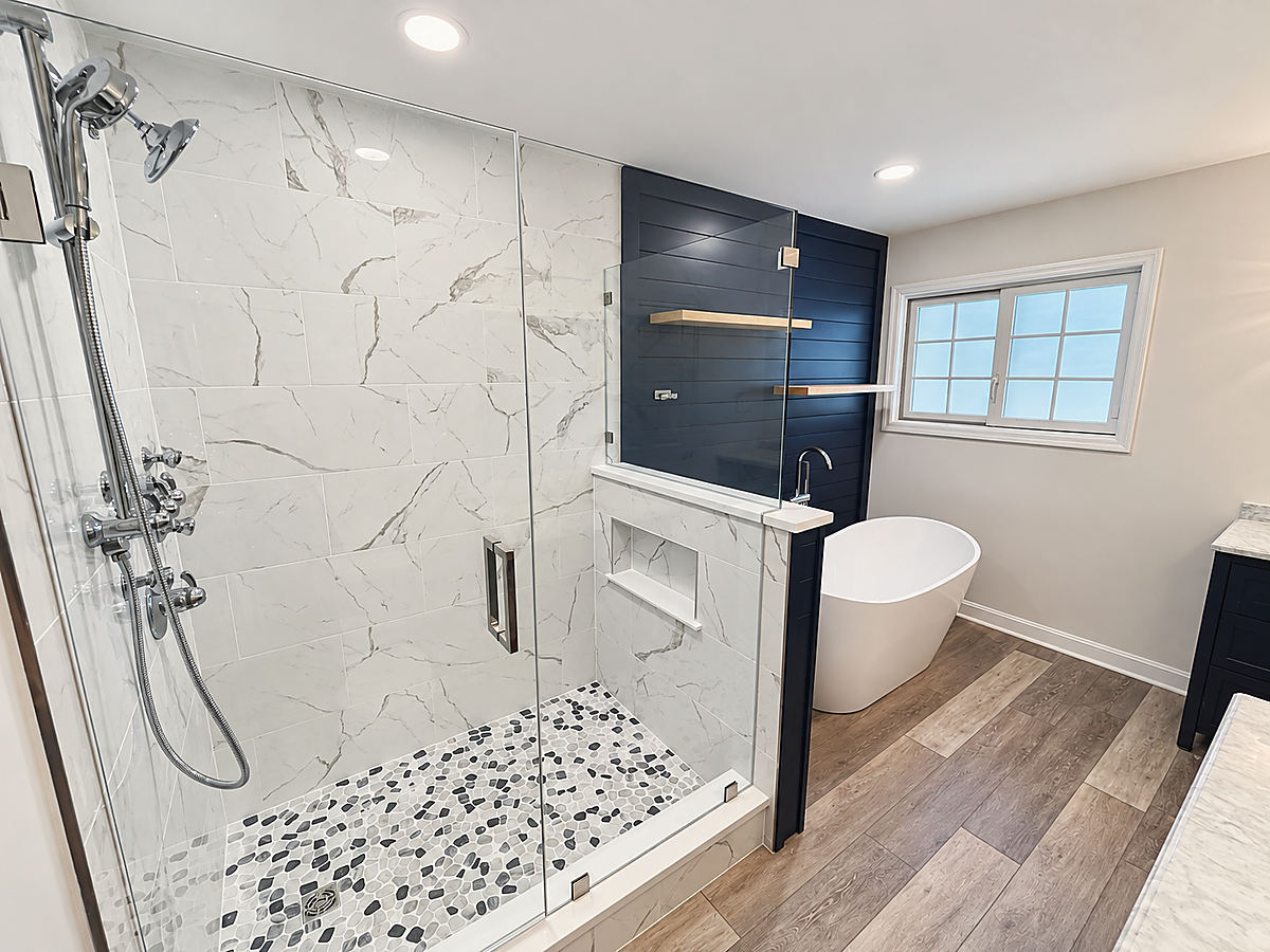 A Del Mar bathroom remodel: marble walk-in shower and freestanding tub